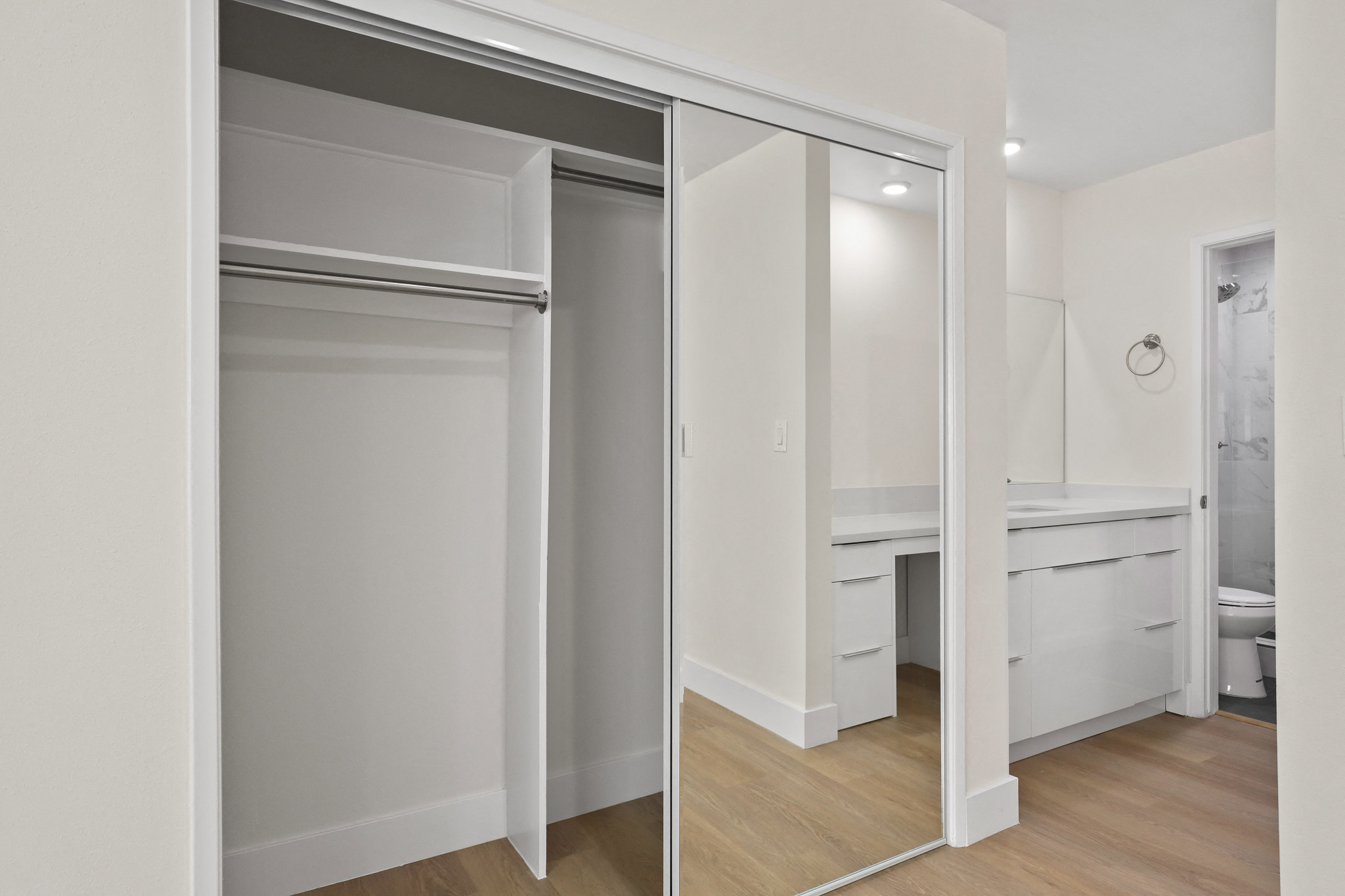 Full-Size Closet and Bathroom with with Walk-In Shower