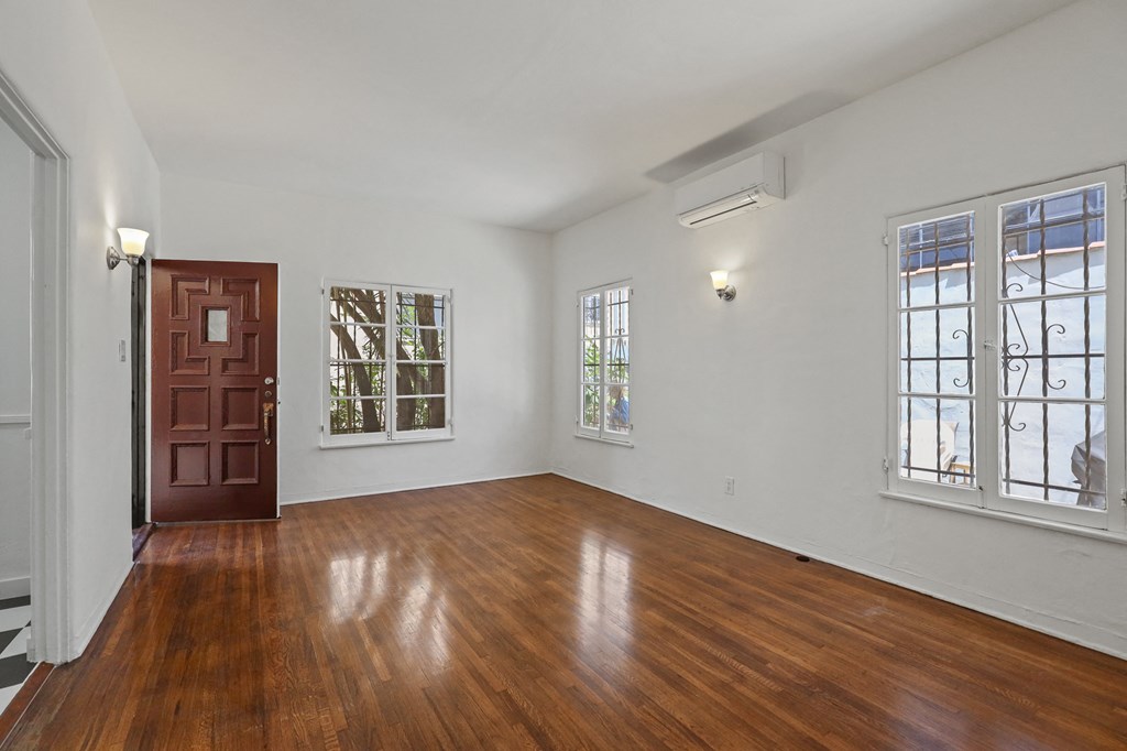 Living Room Area with Hardwood Floors and Lots of Natural Light