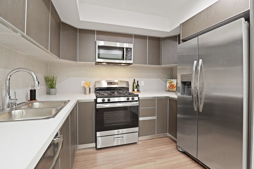 West LA apartment with modern kitchen with stainless steel appliances