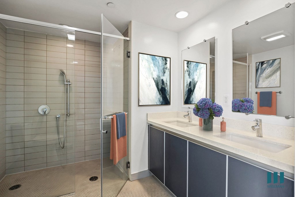 Bathroom with Large-Size Walk-In shower, Double-Sink Vanity, and Vanity Cabinet Storage