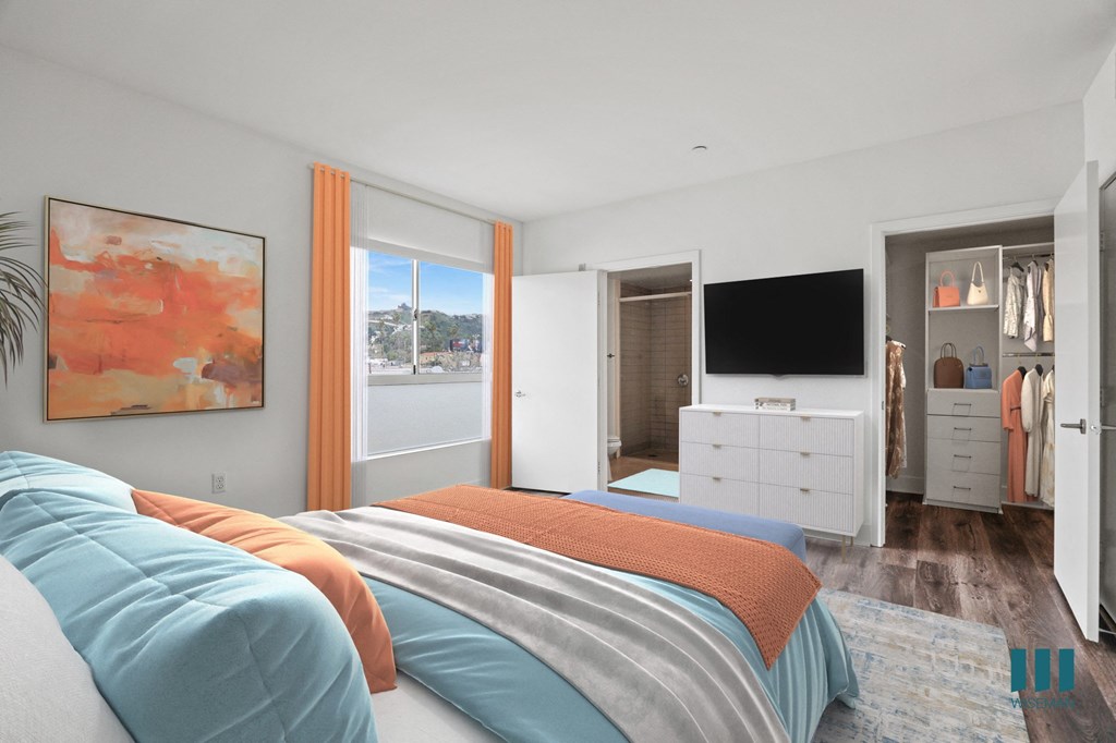 Bedroom with Walk-In closet with BuiltIn Organizers, Bathroom, Vinyl Flooring, and Recessed Lighting