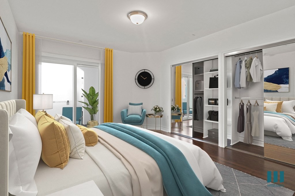 Bedroom with Two-Mirrored Closets, Vinyl Flooring, Bathroom, and Patio