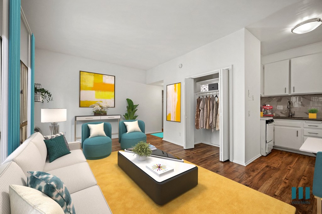 A modern living room with a white sofa and a yellow coffee table.