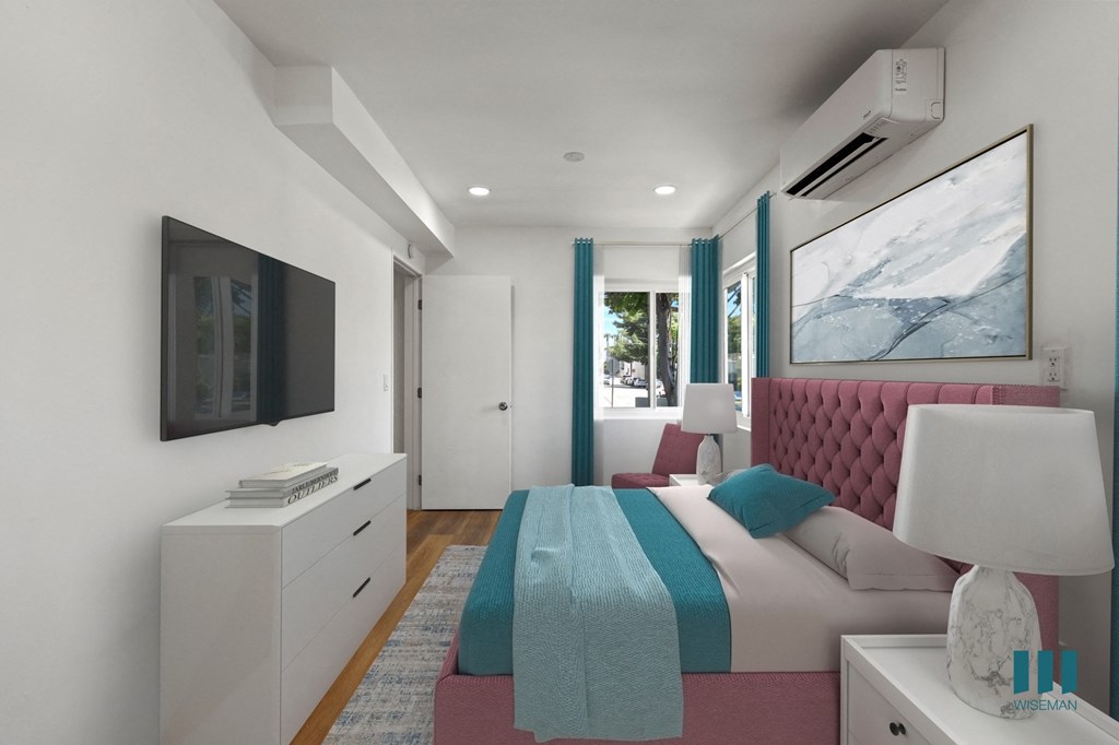 Bedroom with Vinyl Flooring, Recessed Lighting, and Lots of Windows