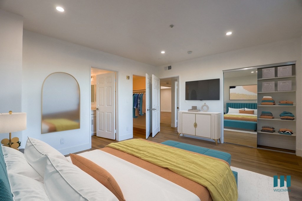 Large-Size Bedroom with Mirrored Closet with Shelving, Vinyl Flooring, and Bathroom