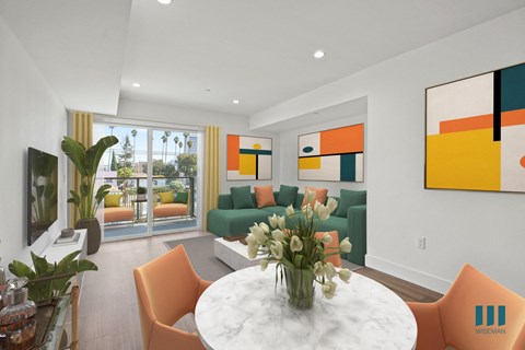 A living room with a white table and orange chairs.