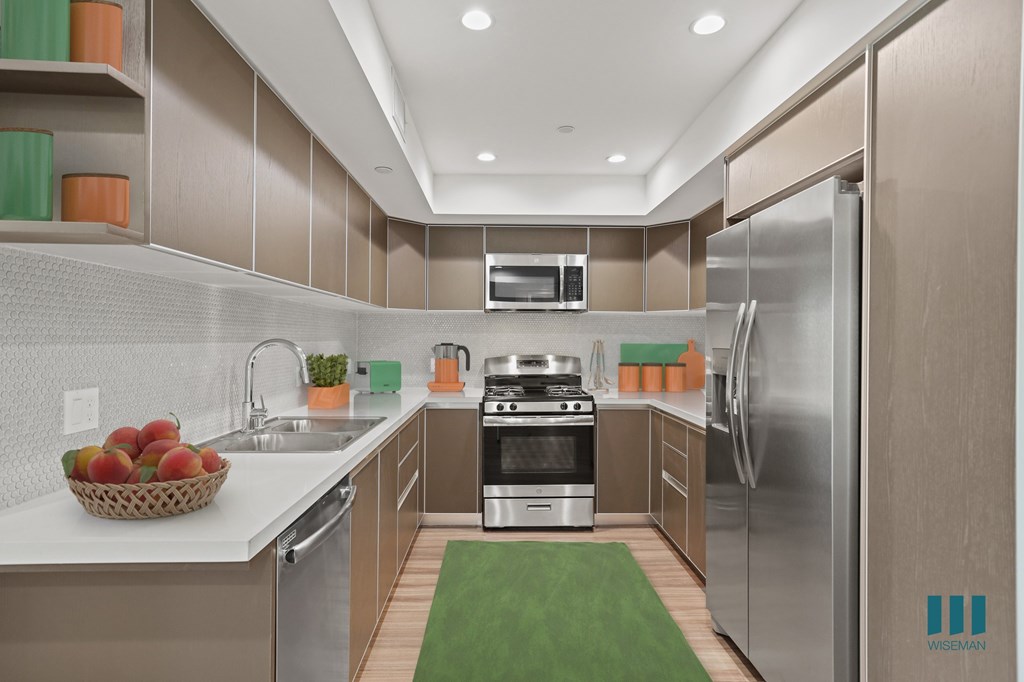 Full-Size Kitchen with Stainless-Steel Appliances and Ample Cabinet Storage
