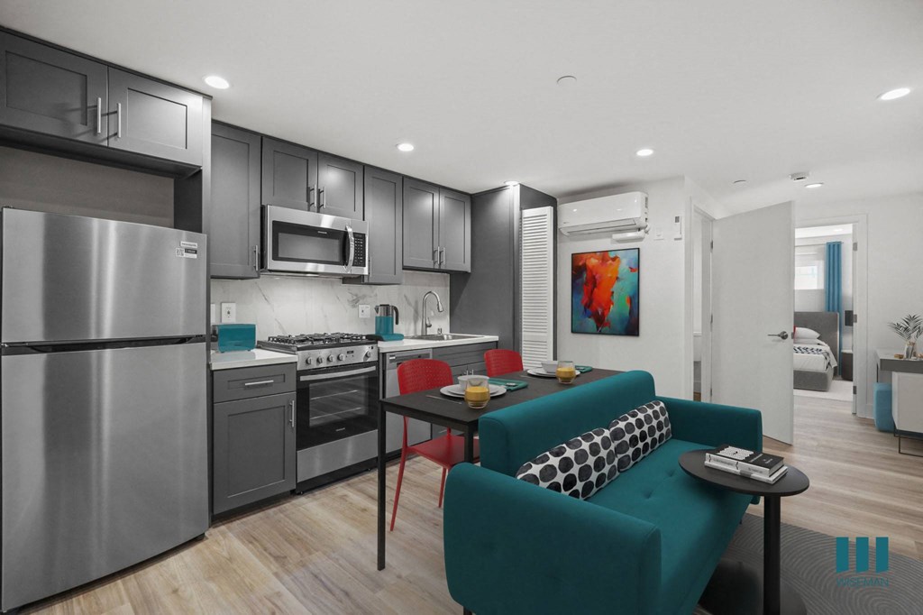 Kitchen with Stainless-Steel Refrigerator, Stove, and Dishwasher