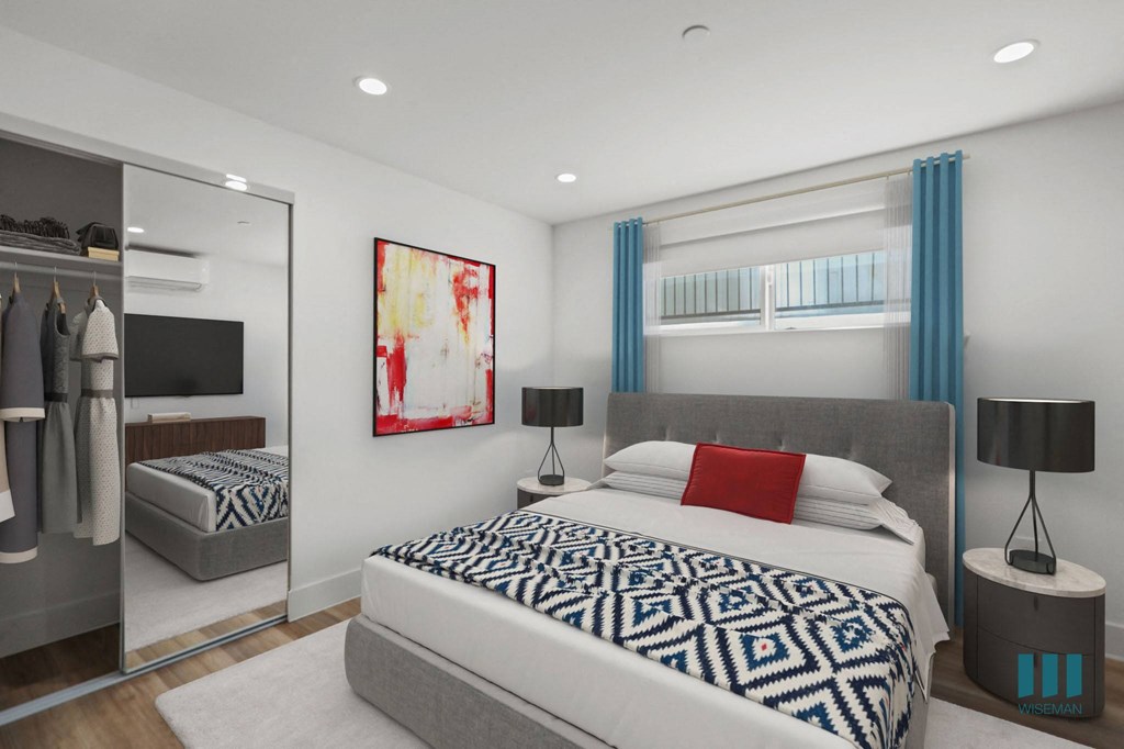 Bedroom with Mirrored Closet with Shelving