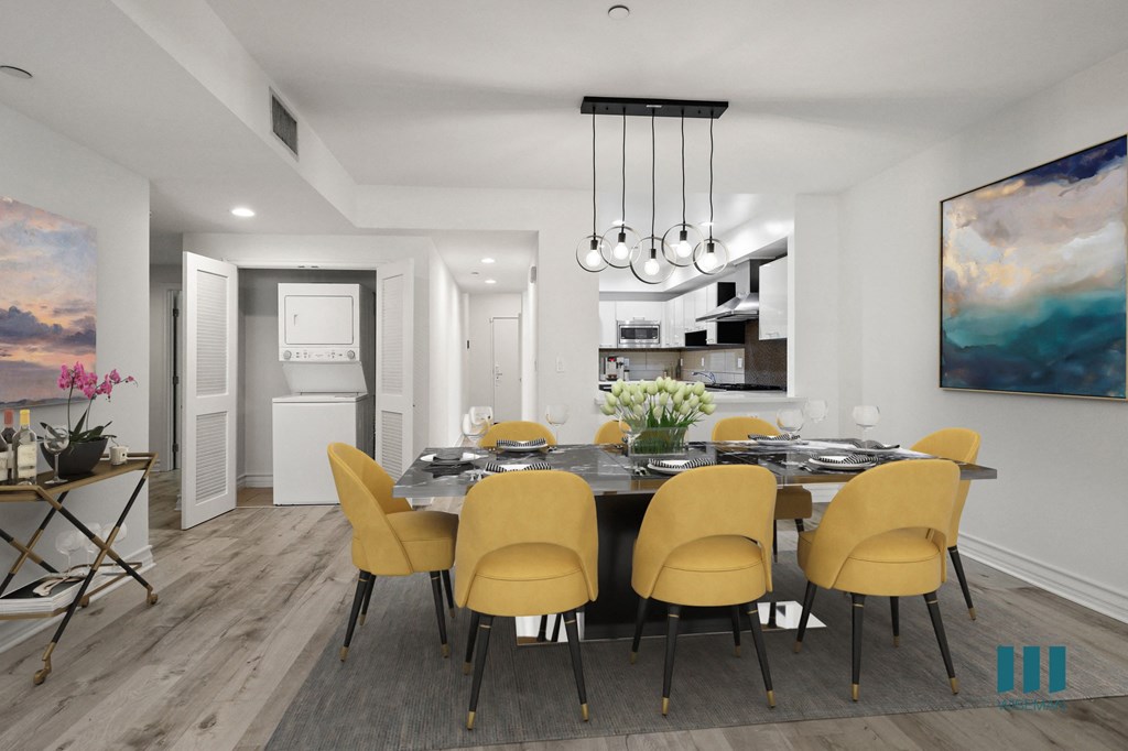 Open-Concept Kitchen and Dining Space with In-Suite Washer & Dryer Open-Concept Kitchen and Dining Space with In-Suite Washer & Dryer