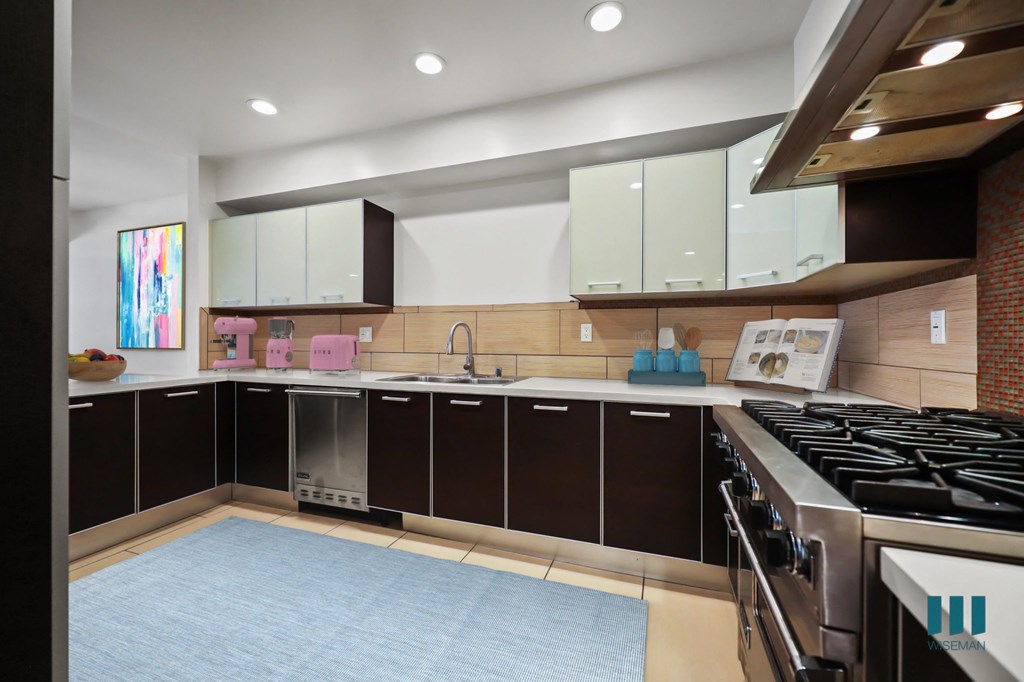 Large-Size Kitchen with Stainless-Steel Appliances and Ample Cabinet Storage
