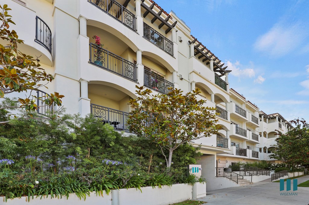 Sidewalk View of Sweetzer on Third by Wiseman