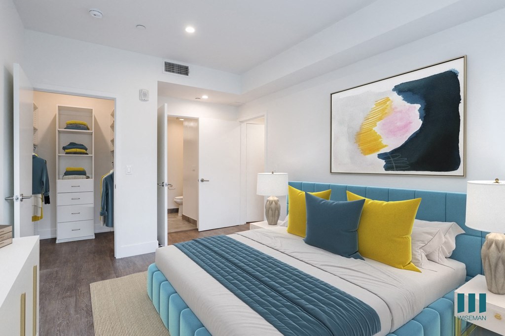 Bedroom with Walk-In Closet with Built-In Organizers