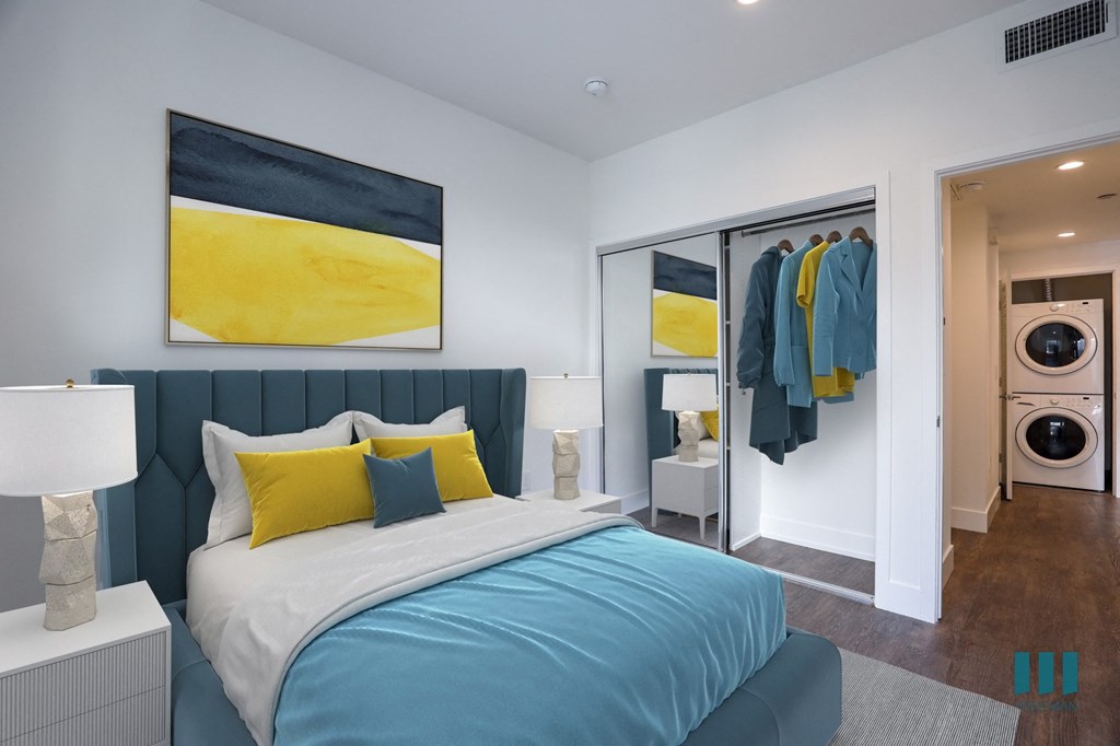 In-Suite Washer & Dryer and Bedroom with Mirrored Closet and Recessed Lighting