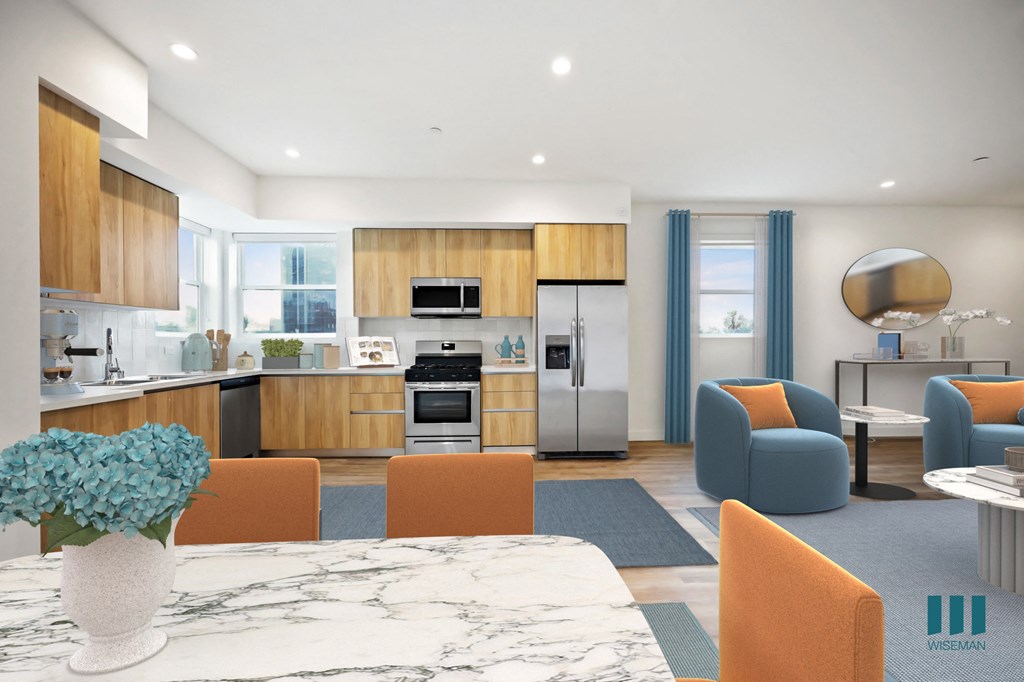 a living room and kitchen with a table and chairs