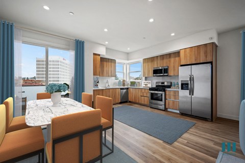 a kitchen and living room with a table and chairs