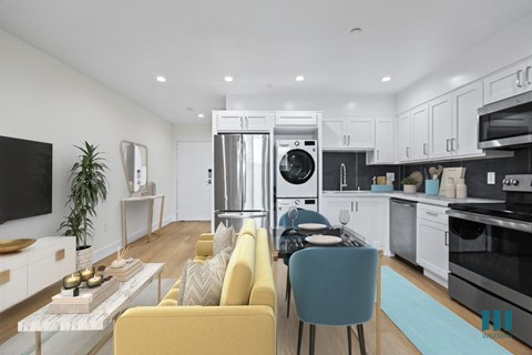Open-Concept Kitchen with Energy-Efficient Appliances including In-Suite Washer & Dryer