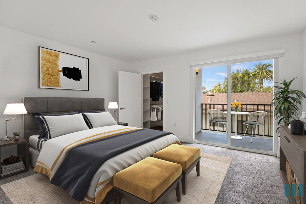 Bedroom with Walk-In Closet with Built-In Organizers and Spacious Patio
