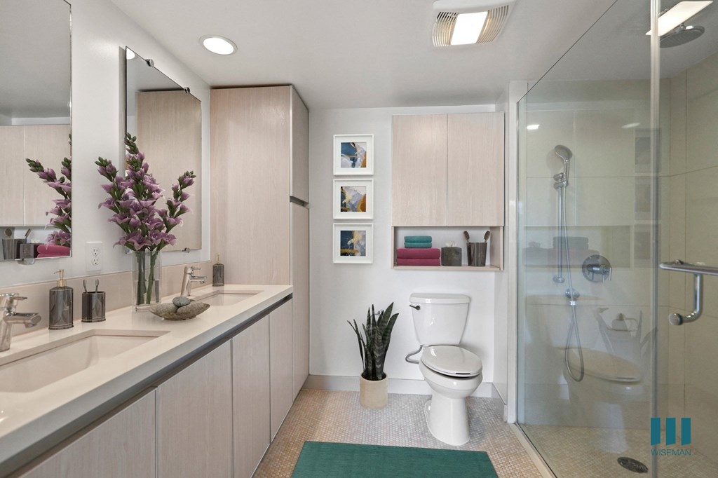 Bathroom with Walk-In Shower & Glass Door, and Vanity Cabinet Storage