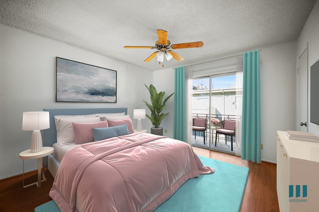 Bedroom with Mirrored Closet, Vinyl Flooring, Ceiling Fan, and Windows
