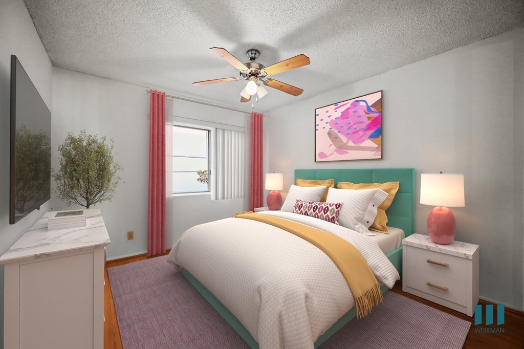 Bedroom with a Ceiling Fan and Vinyl Flooring