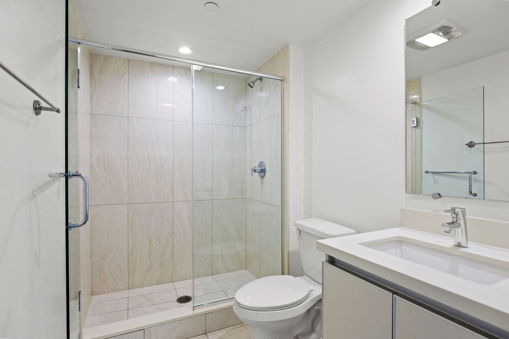 Bathroom with Walk-In Shower and Vanity Cabinet Storage