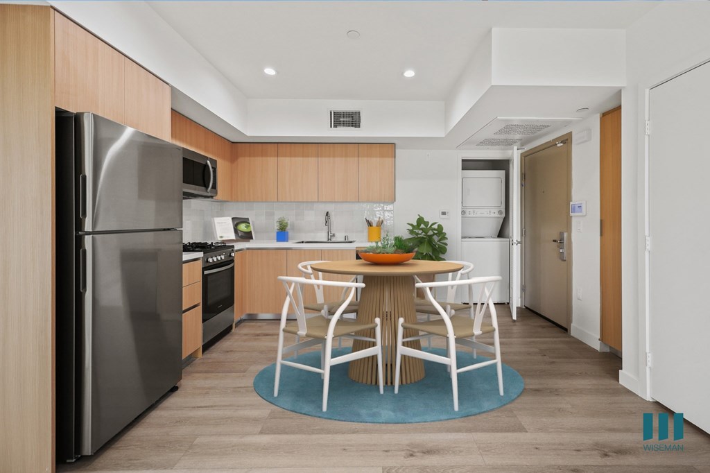 Open-Concept Kitchen with In-Suite Washer & Dryer - Pacific Floor Plan