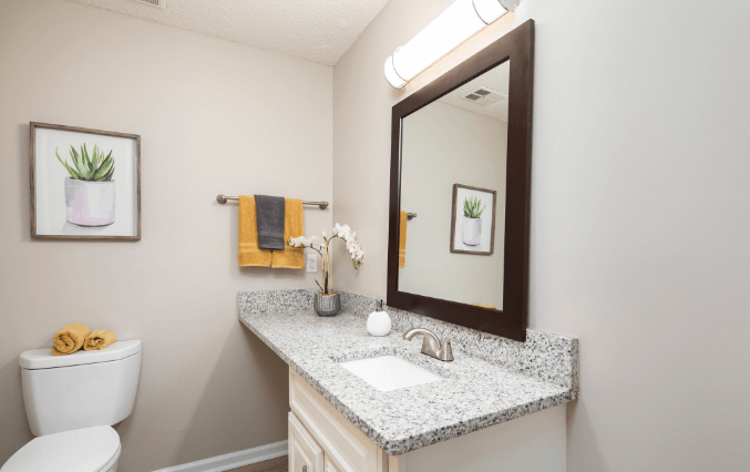 a bathroom with a sink and a toilet at Crestwood Green, LLC, Birmingham, AL 35212