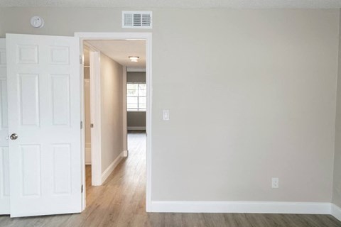 a bedroom in a home at Ridge Apartments in South Daytona, FL