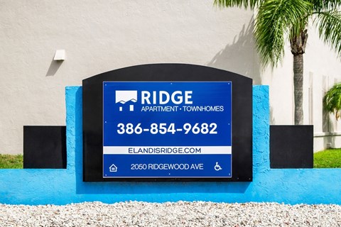 the monument sign in front of Ridge Apartments in South Daytona, FL
