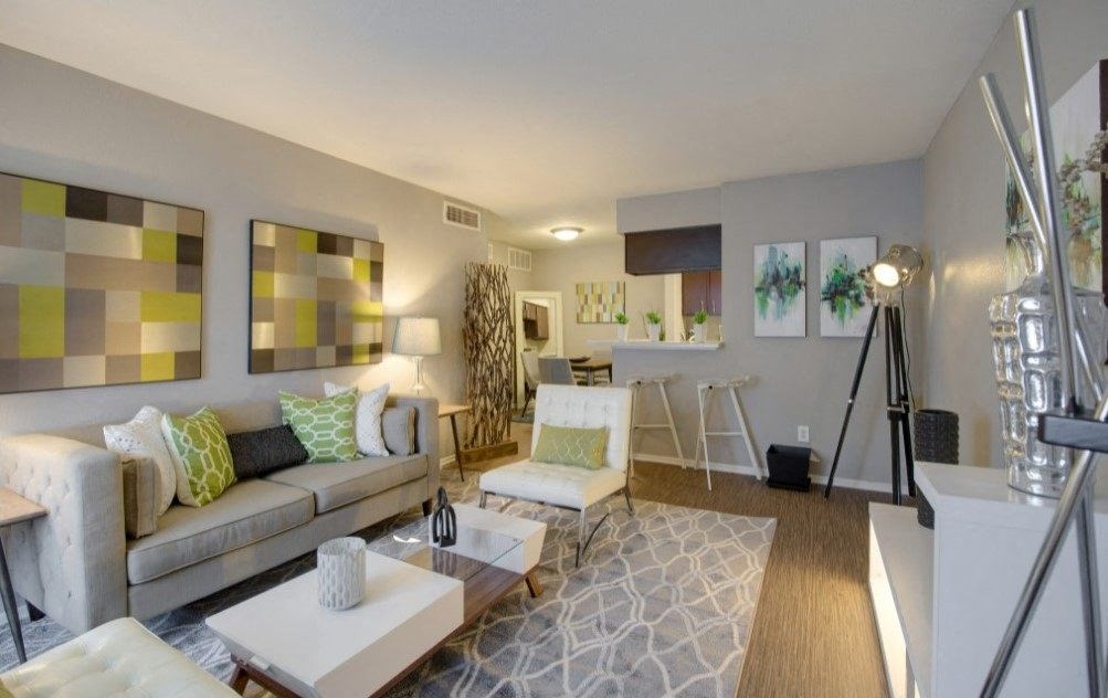 a living room with a couch and a table