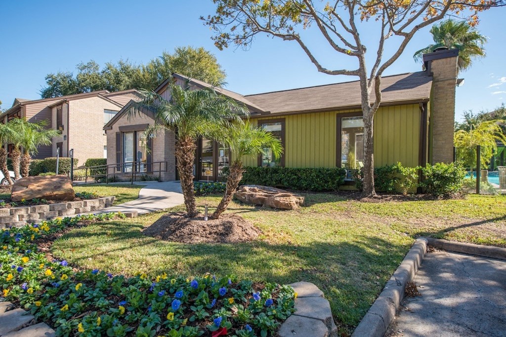 Lush, professional landscaping at Hudson at Westchase Apartments in Houston