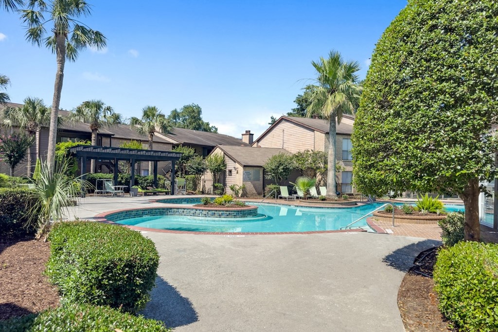 The resort-style pool and sundeck at Hudson at Westchase Apartments