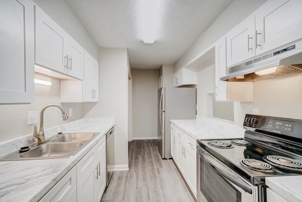a renovated kitchen with ample cabinetry at Hills at Hoover 35216