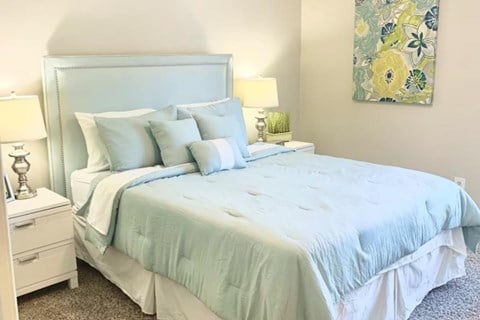 Hills-Hoover_Bedroom2 a bedroom with model furnishings at Hills at Hoover 35216