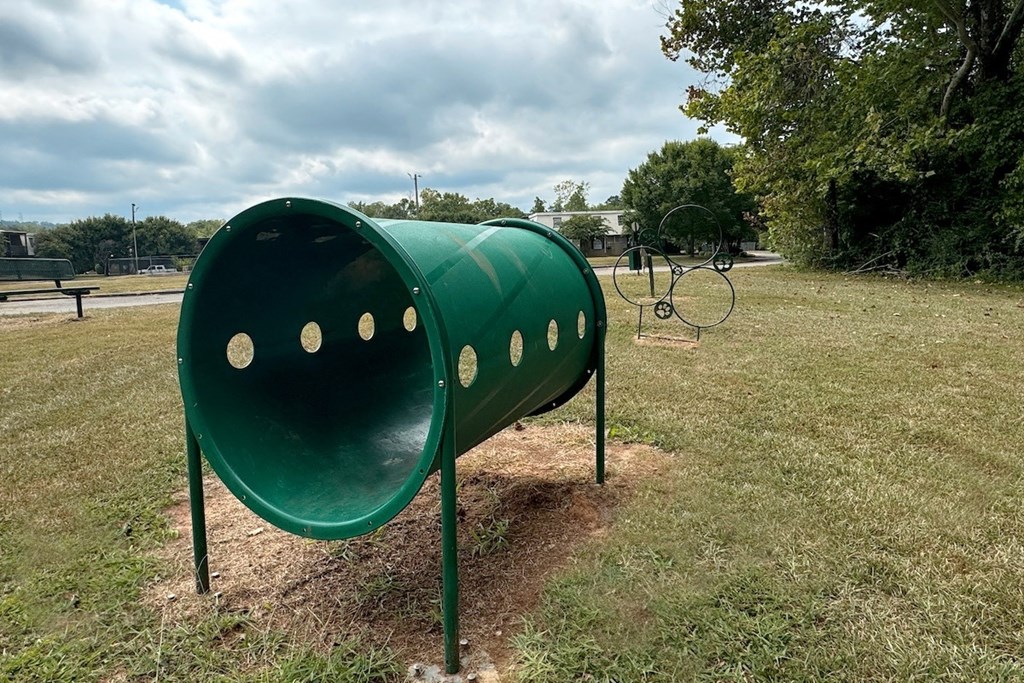 a green mailbox on the side of a park a green mailbox on the side of a park at Spring Lake Cove Apartments, Birmingham Alabama