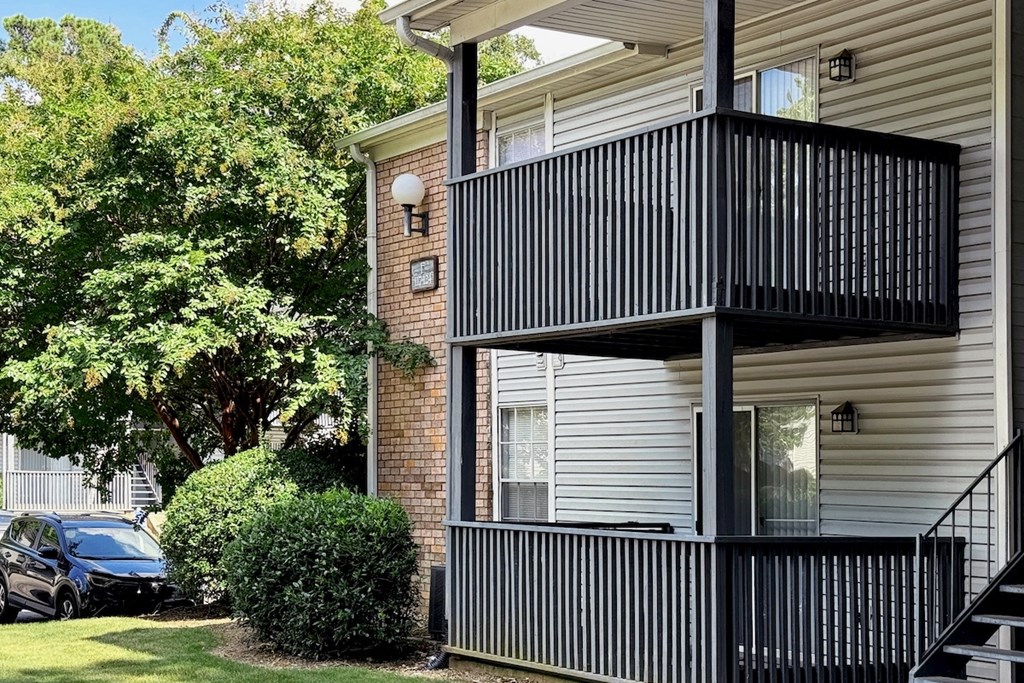 a balcony on the side of a apartment building a balcony on the side of a apartment building at Ascot Place Apartments, Birmingham, 35235