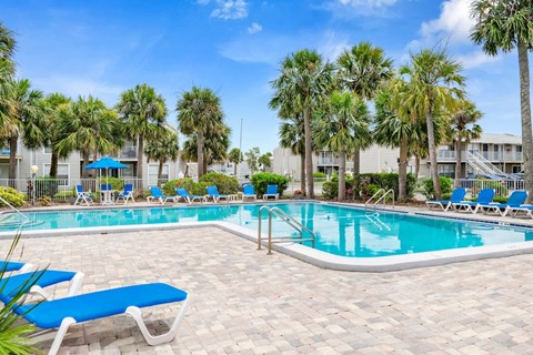 12th and beach swimming pool and sundeck with lounge chairs