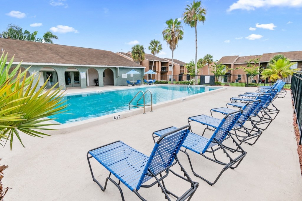 Residents at Winford Place enjoy a relaxing pool and sundeck with plenty of lounge chairs