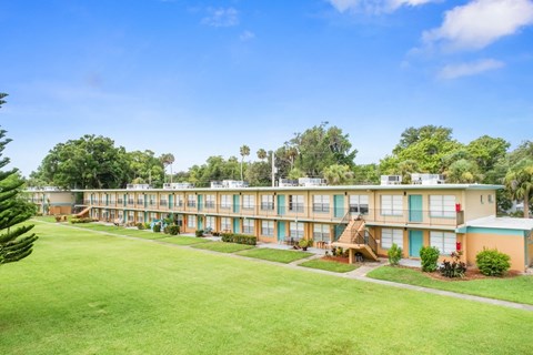 Neat sidewalks and green space at Park Apartments in beautiful Daytona Beach, FL