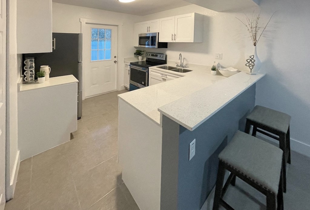Serenity_Lake-Kitchen1 a renovated kitchen with stainless steel appliances at Serenity Lake Apartments