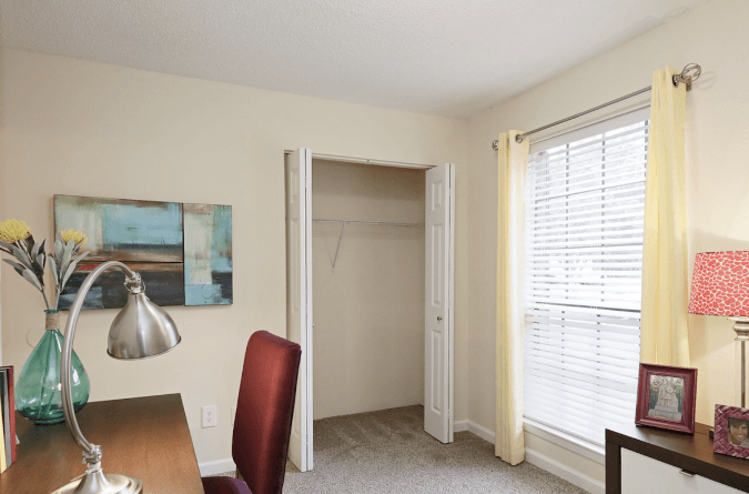 a bedroom with a closet at Crestwood Green, AL 35212
