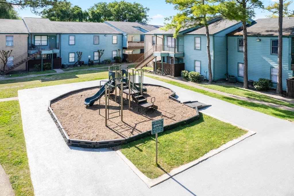 the modern playground at Waters at Westchase Apartments in Houtson