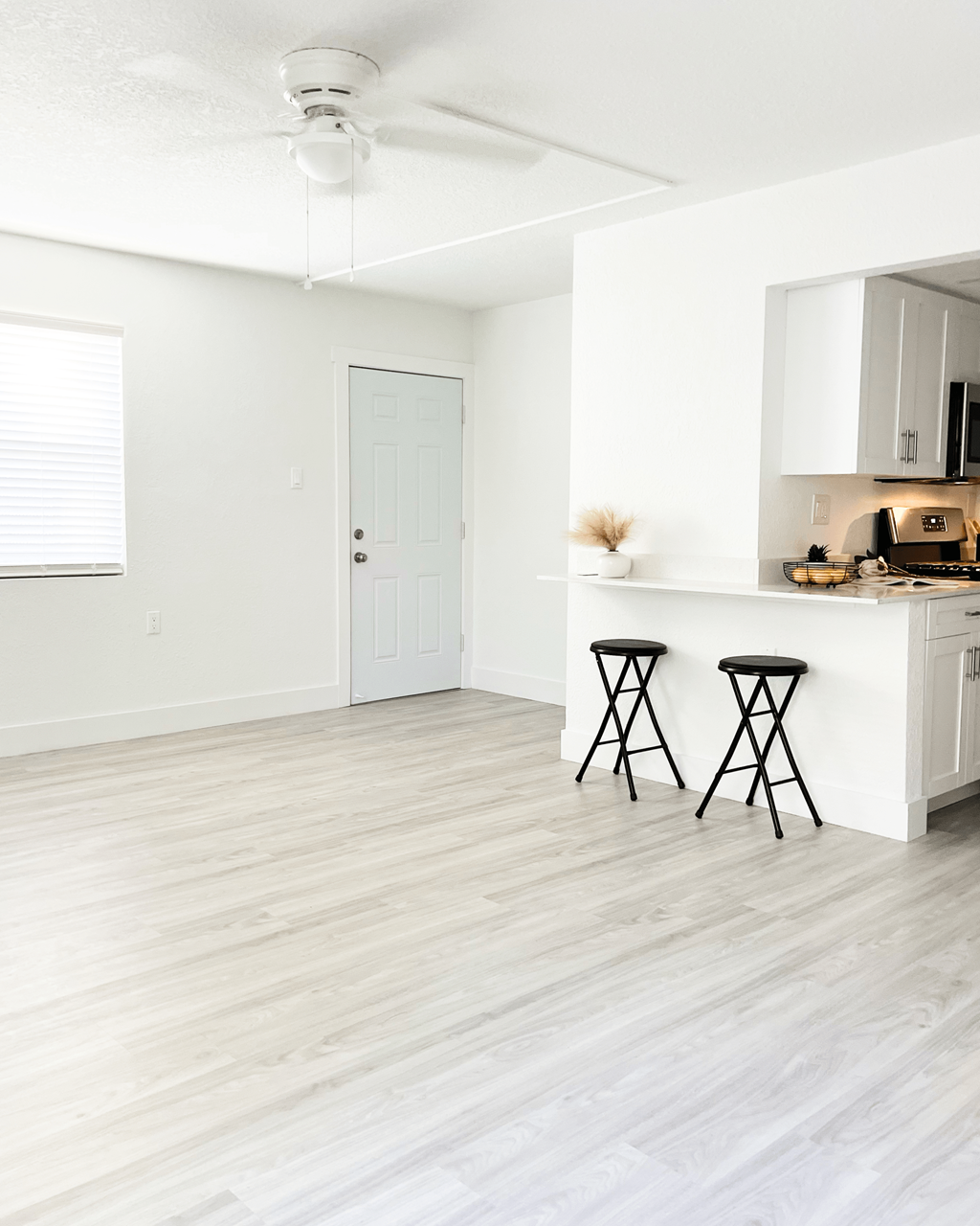 a kitchen and dining area in a 555 waverly unit