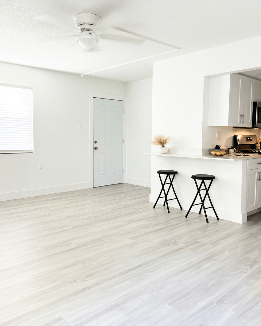 a kitchen and dining area in a 555 waverly unit - Photo Gallery