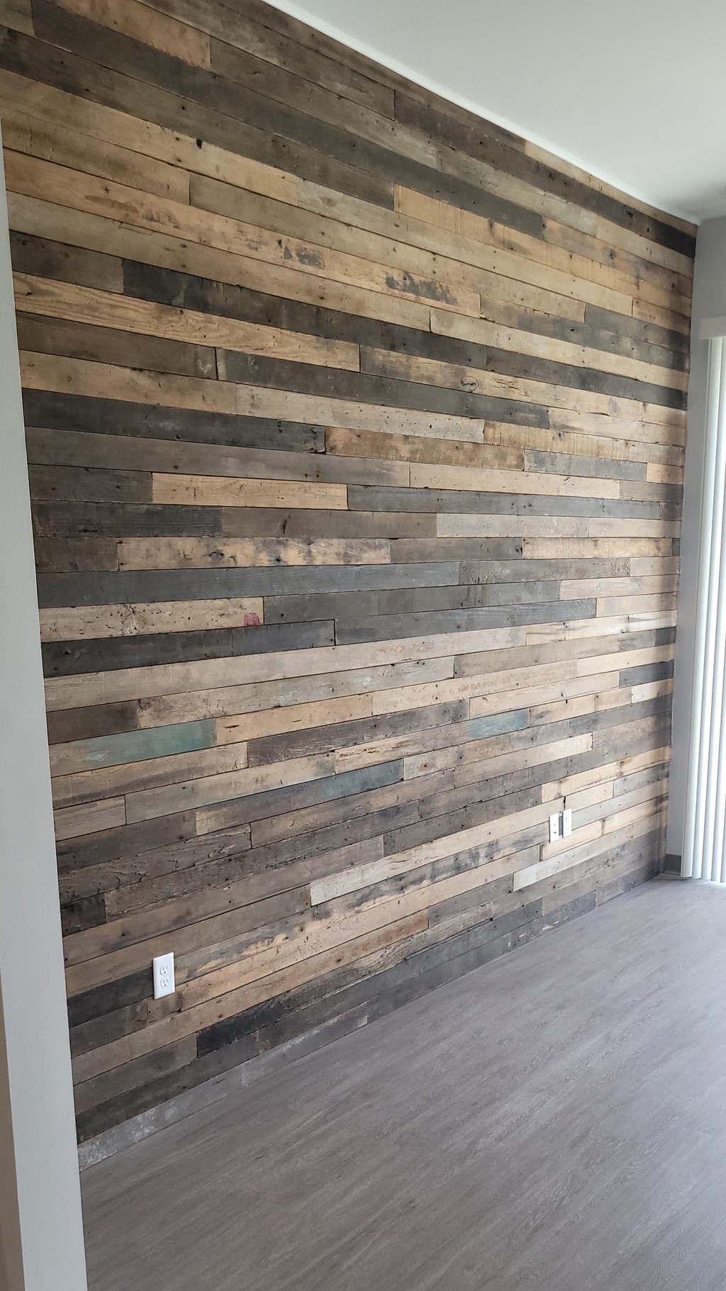 a close up of a wooden wall in a room