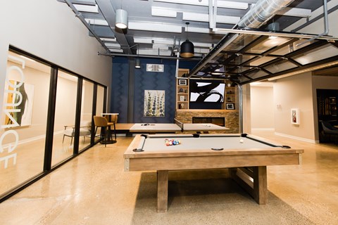 a billiards table in a room with a pool table