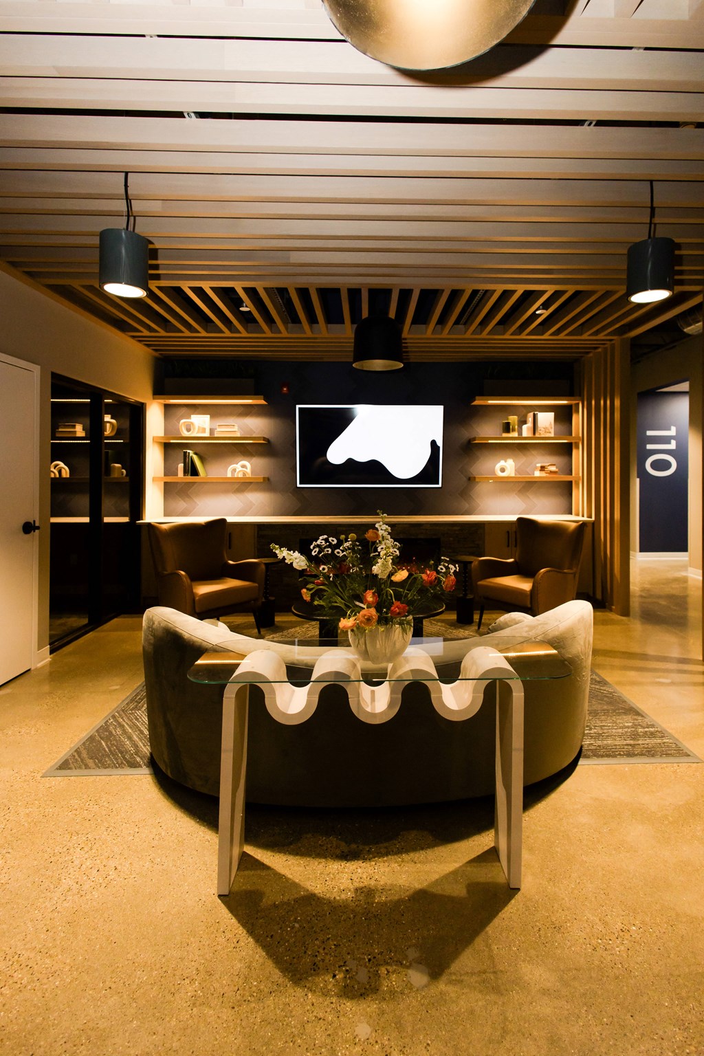 a living room with a couch and a table