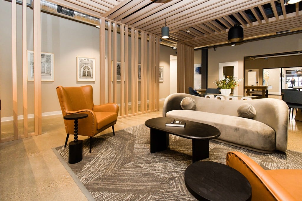 a living room with a couch and a table