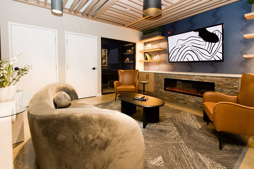 a living room with a couch and a tv